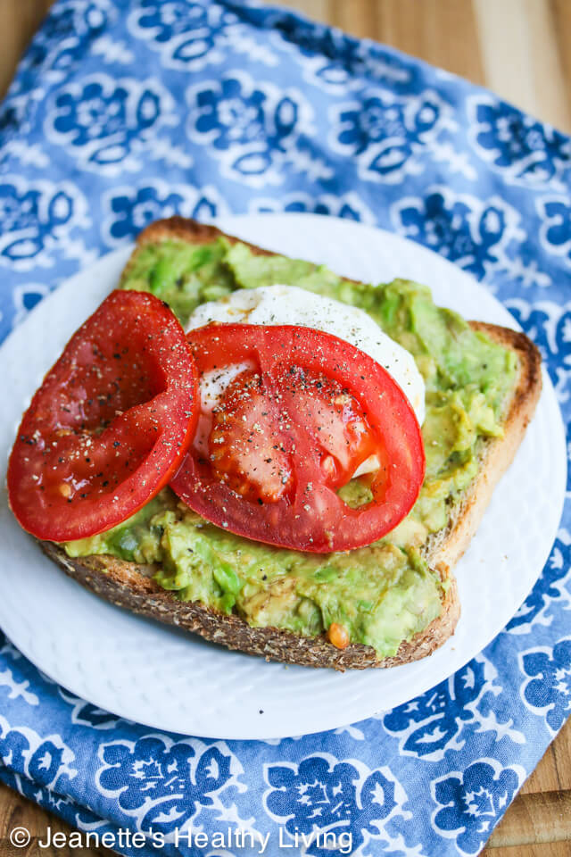 Breakfast Smashed Avocado Tomato Toast with Fried Poached Egg