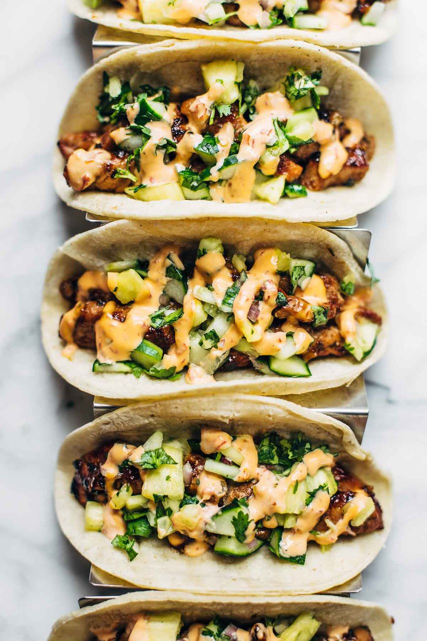 CARAMELIZED PORK TACOS WITH PINEAPPLE SALSA AND CHILI SAUCE
