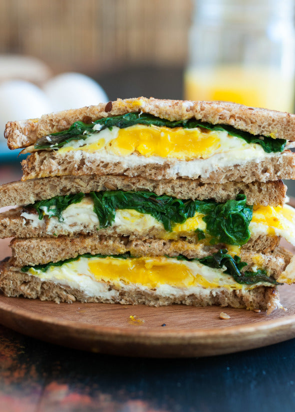 EGG, GREENS AND GOAT CHEESE BREAKFAST SANDWICH