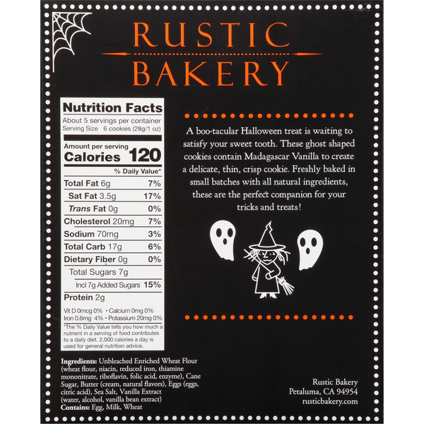A Halloween-themed product label or packaging design for Rustic Bakery, featuring a black background with white text, a nutrition facts panel, spooky illustrations including a spider, ghosts, and a witch, and decorative orange dots along the top and bottom borders.