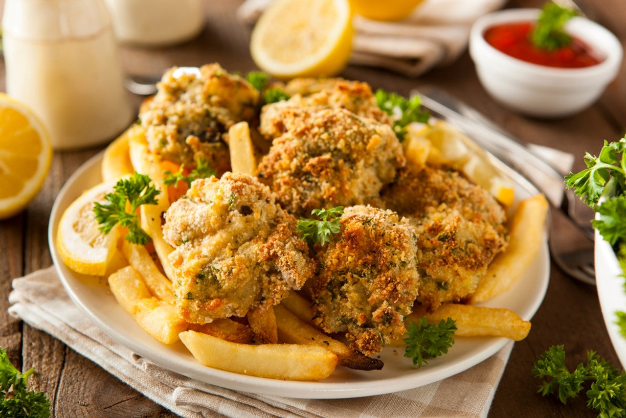 Boudreaux's Homestyle Breaded Oysters - 2 lb Bags, 25-35 Count - 5/Case
