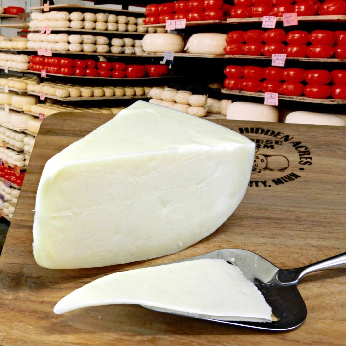 Eichtens Tilsit Cheese Quarter Round Wheel Cheese Wedge - 10 lb