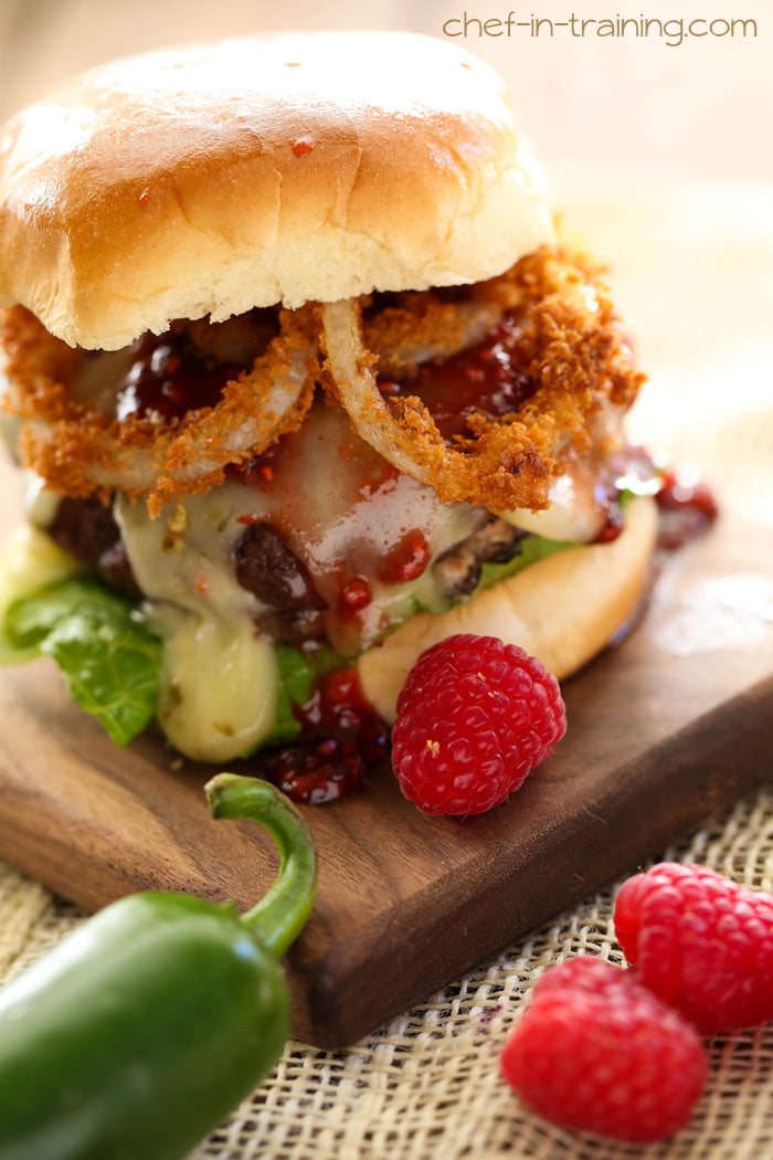 Creamy Jalapeño Stuffed Burgers with Raspberry Chipotle Sauce
