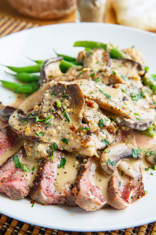 Mushroom and Peppercorn Crusted Steak in a Creamy Brie Mushroom Sauce