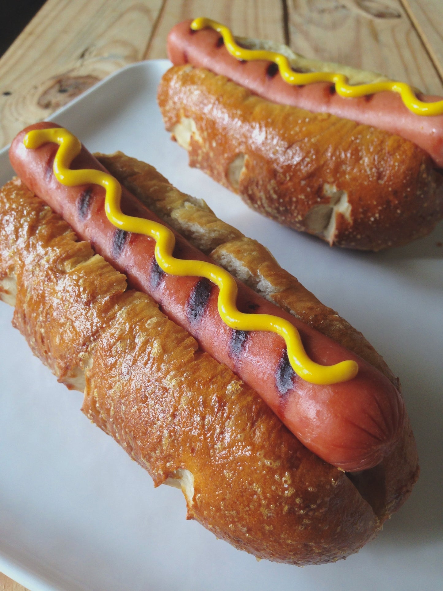 Bavarian Pretzel Sliced Hot Dog Roll - 3.2 oz - 6 " Long - 50/Case