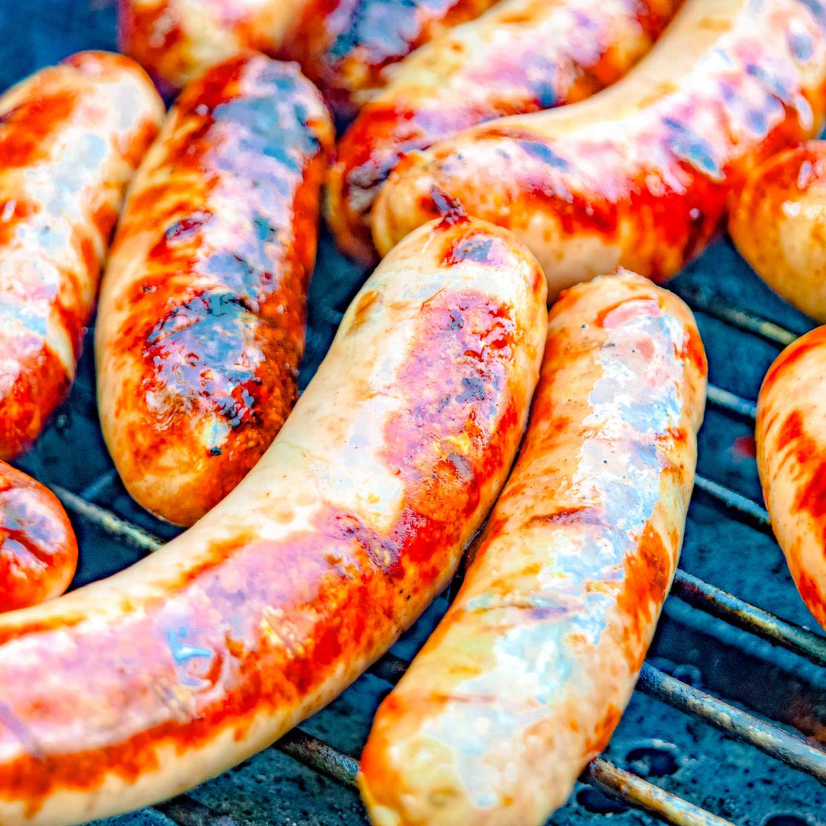 Grilled sausages on a barbecue grill