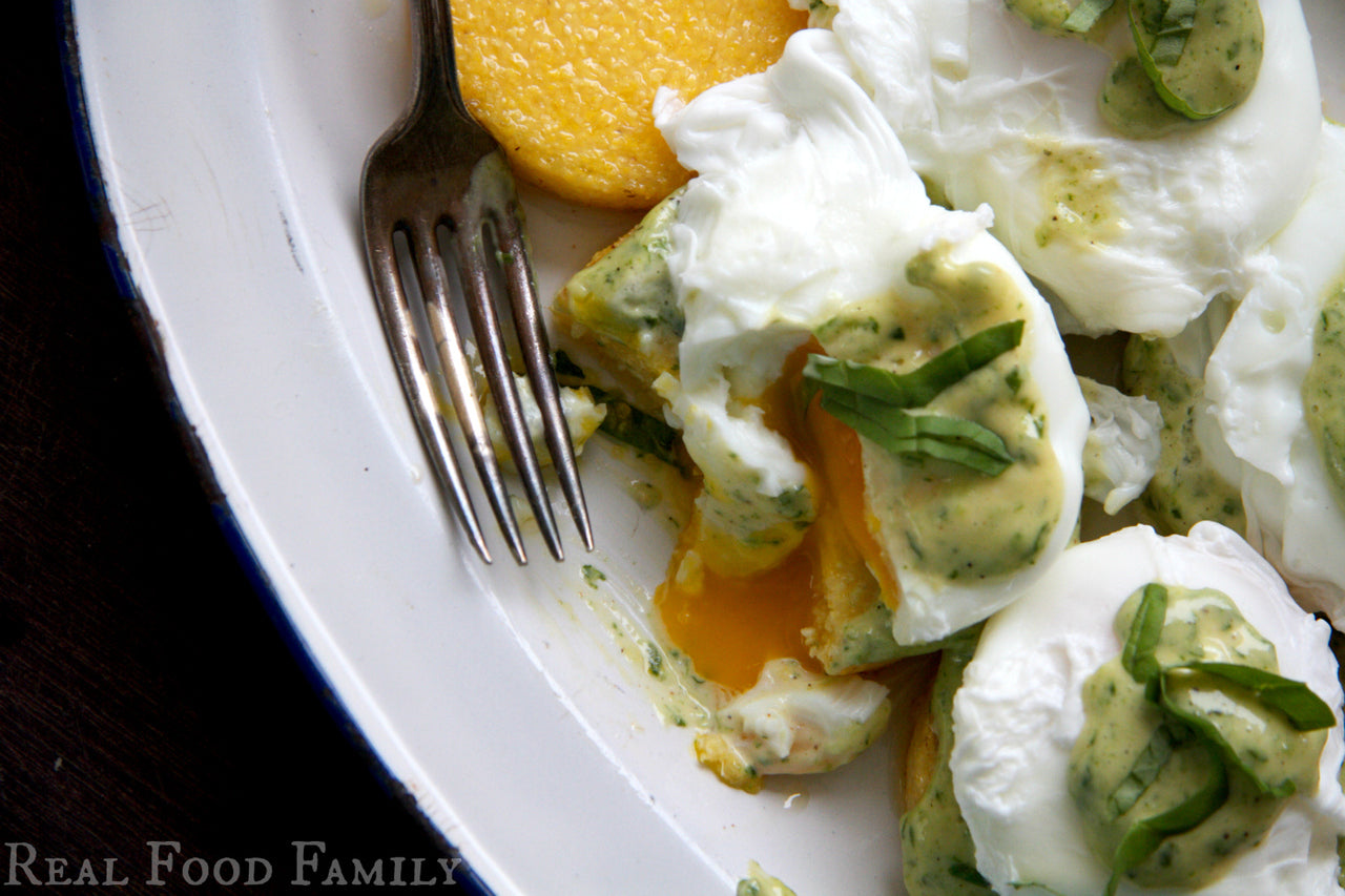 Gluten Free Eggs Benedict on Polenta Cakes with Pesto Hollandaise