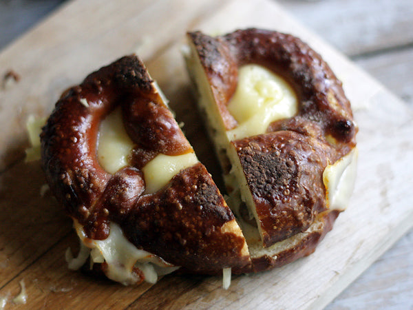 Bratwurst, Sauerkraut, and Muenster Cheese Grilled Cheese on Soft Pretzel