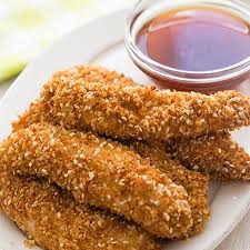 SESAME CHICKEN TENDERS - 35 pieces per tray