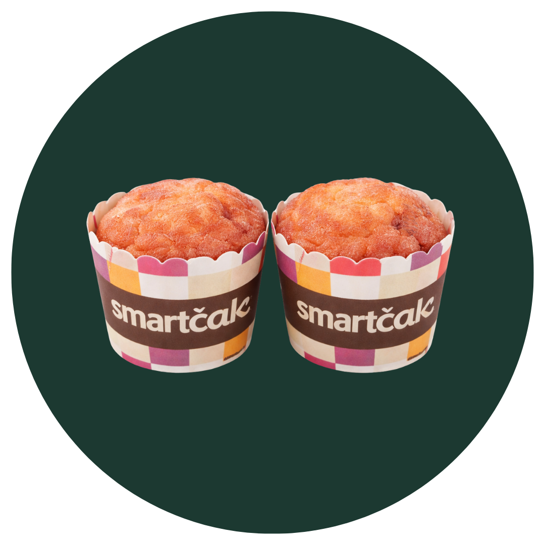 Two mini muffins in branded smartcale paper cups, centered inside a dark green circular frame.