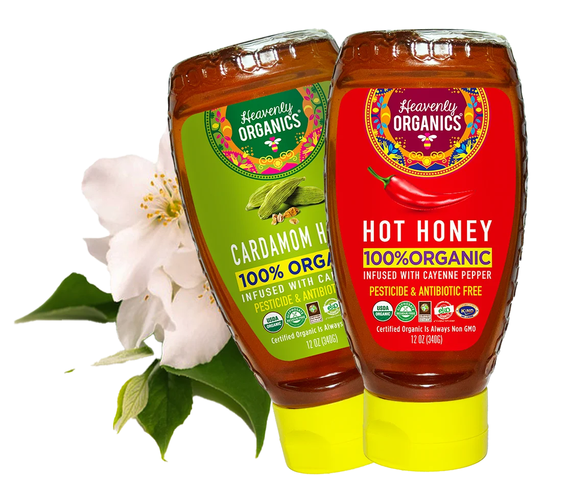 Heavenly Organics Hot Honey and Cardamom Honey bottles with yellow squeeze caps
