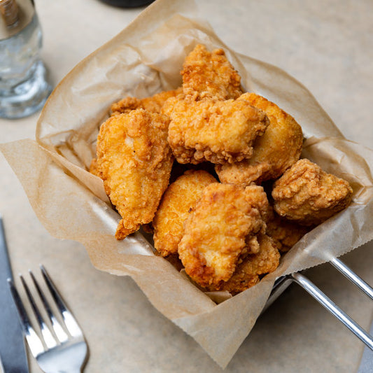 Fully Cooked Boneless Breaded Chicken Breast Wing Fritters - 5 lb - 2/Case