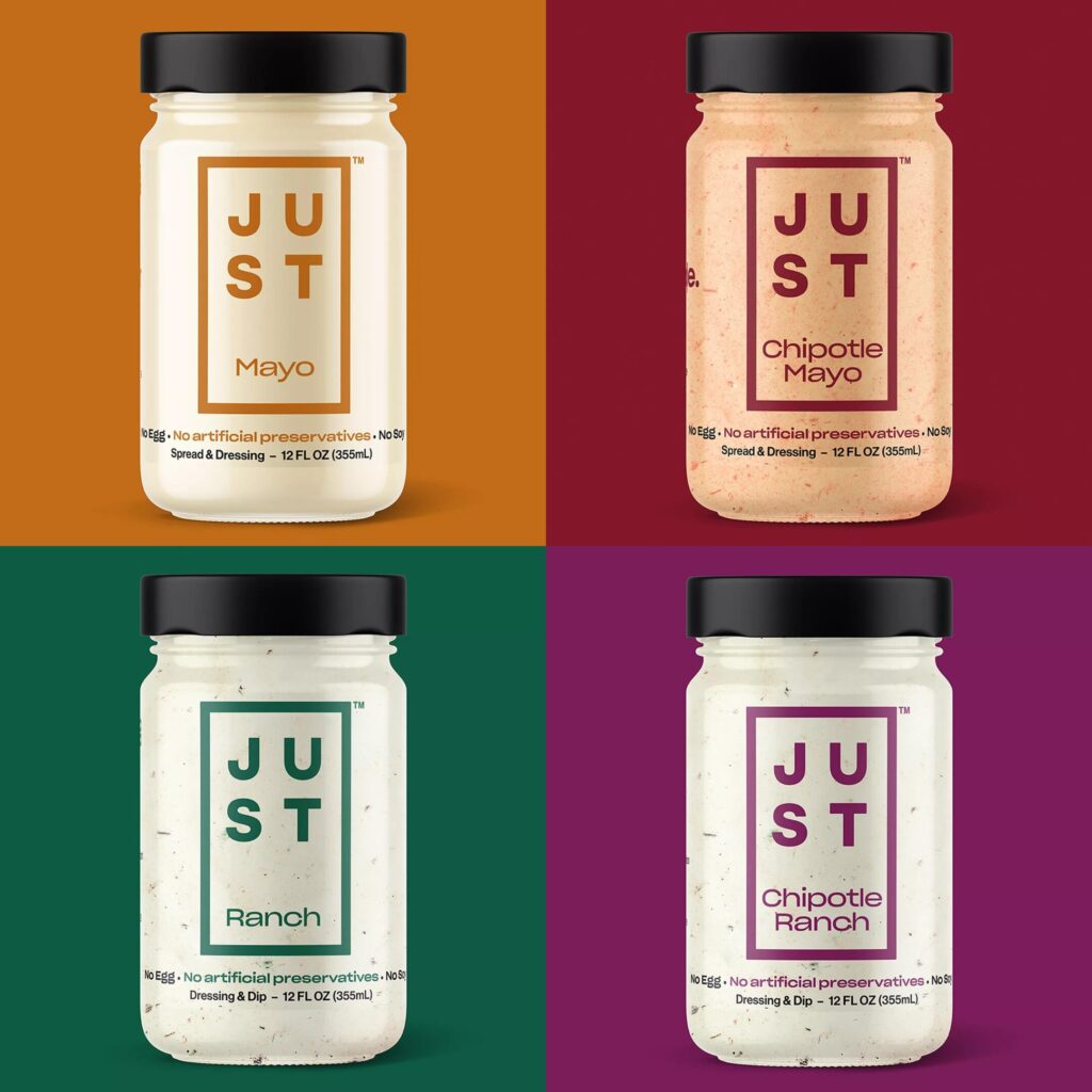 Four glass jars of J.U.
