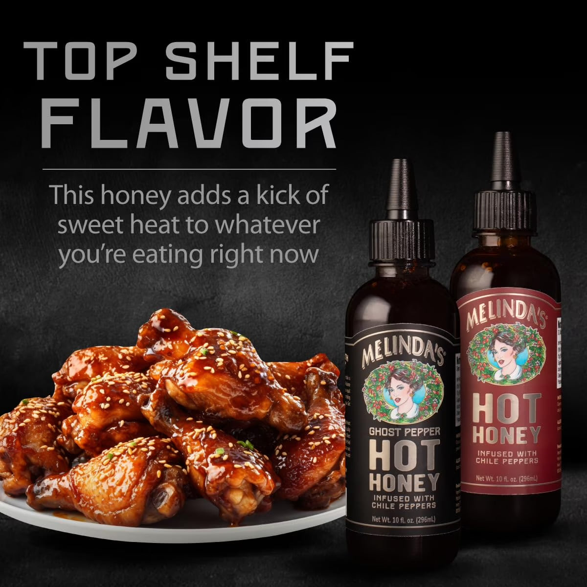 Melinda’s Classic and Ghost Pepper Hot Honey bottles beside glazed chicken wings, with Top Shelf Flavor text
