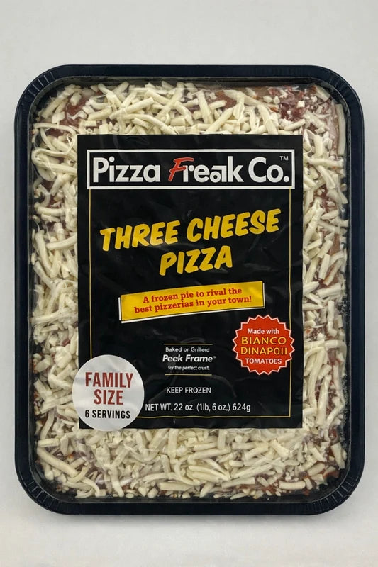 A packaged frozen pizza in a black plastic tray with a clear lid. The product is labeled 'Pizza Freak Co.