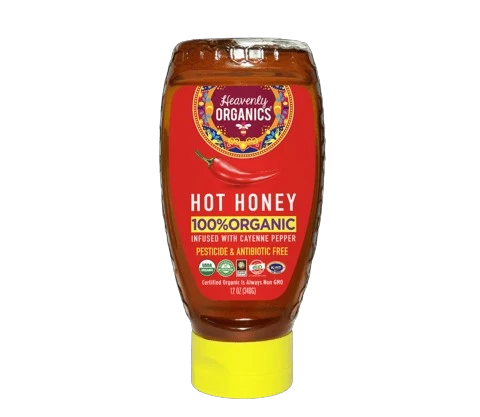 Front view of Heavenly Organics Hot Honey 12 oz bottle with red label and yellow squeeze cap
