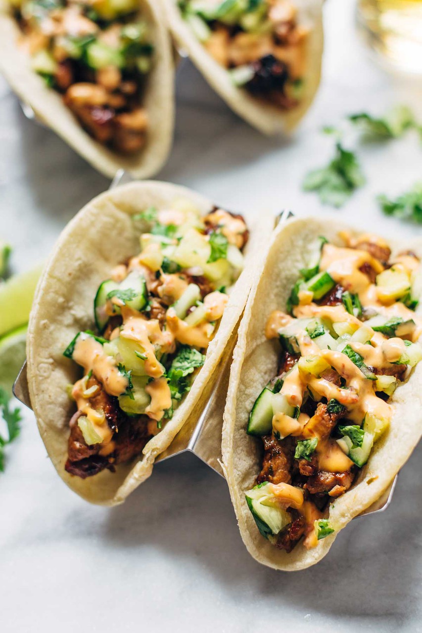 CARAMELIZED PORK TACOS WITH PINEAPPLE SALSA AND CHILI SAUCE