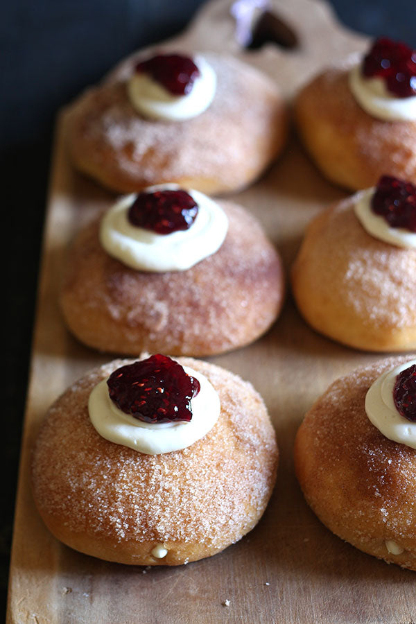 Cheesecake Stuffed Baked Doughnuts