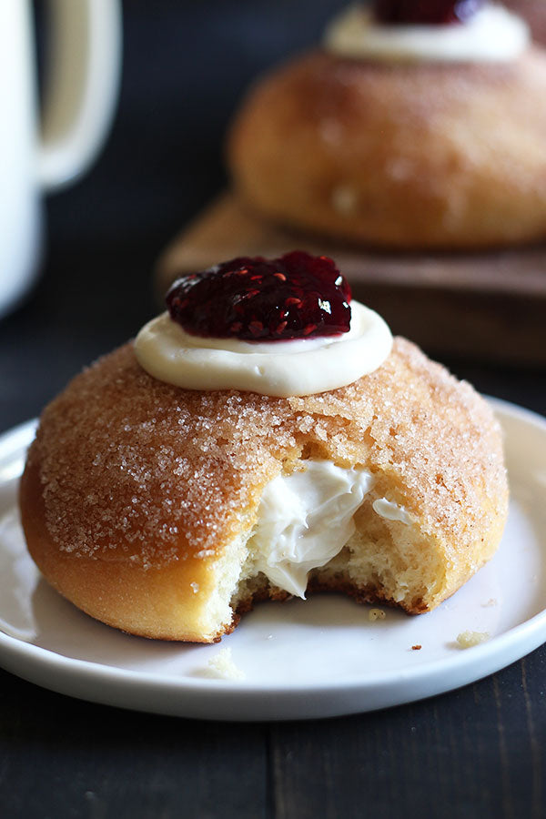 Cheesecake Stuffed Baked Doughnuts