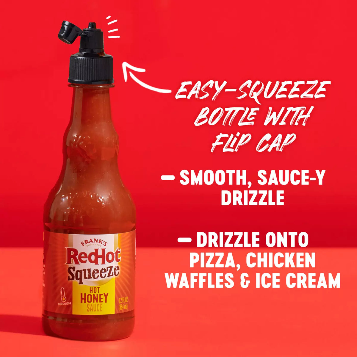 Frank’s RedHot Squeeze Hot Honey Sauce bottle with flip-cap and serving suggestions on a red background
