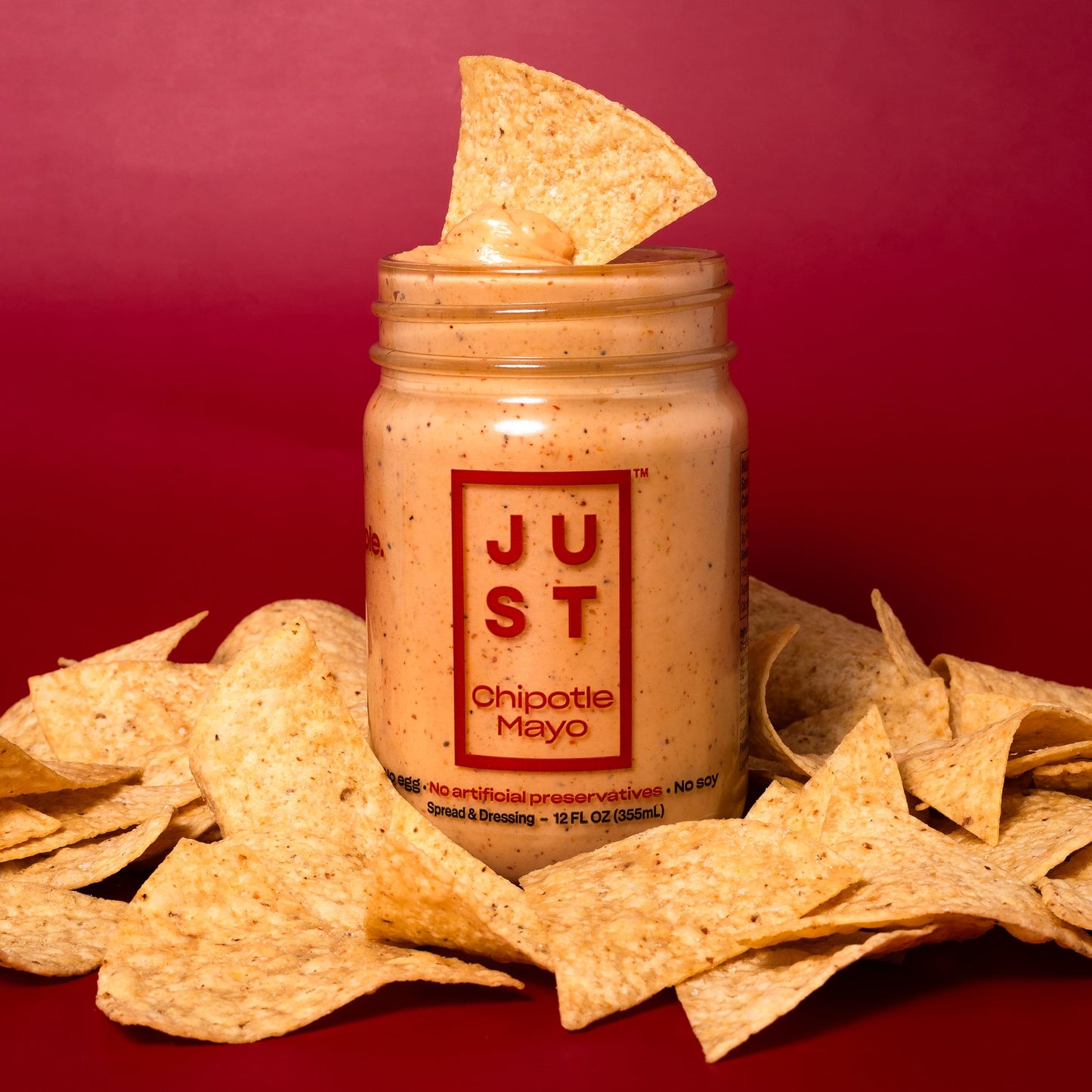One jars of Just Chipotle Mayo plant-based spread and dressing, 12 fl oz each, on a white background.
