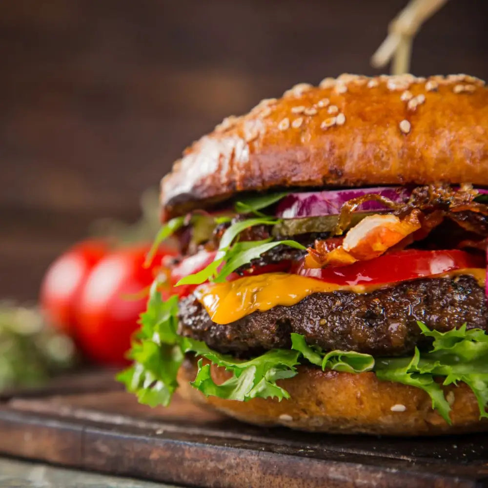 Farmland Foods Silver Medal 8 oz. Black Angus Burgers - 20/Case