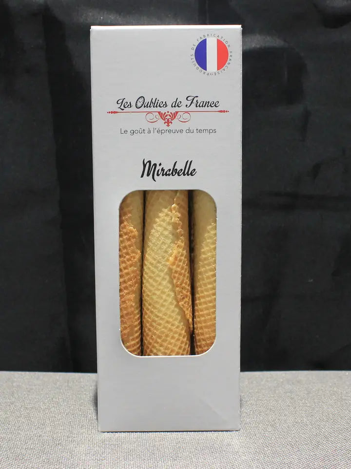 A tall white rectangular box of Mircabelle ice cream waffle cones with a clear window showing the golden cones inside, set against a dark background.