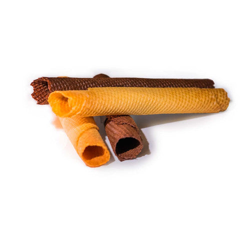 Four waffle- or wafer-rolled snack sticks in assorted brown and orange tones, arranged on a plain white background.