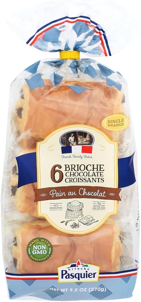 A package of 6 brioche chocolate croissants by Pasquier, shown in a clear plastic bag with a blue, white, and red striped top and a central cream-colored label.