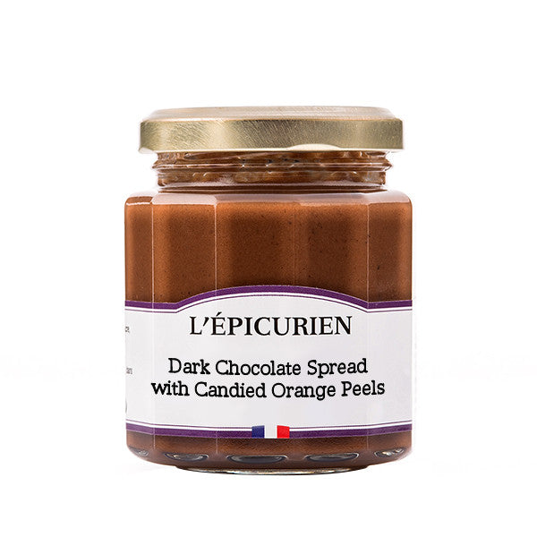 A jar of L'Épicurien Dark Chocolate Spread with Candied Orange Peels, featuring a white label with purple accents and a gold metal lid, set against a plain white background.