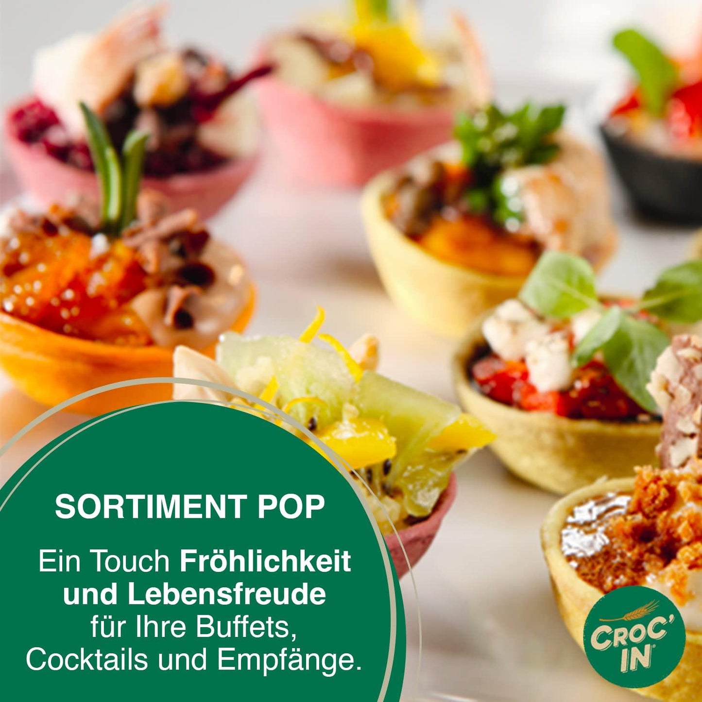 A promotional graphic for CROC'IN 'Sortiment Pop' featuring an assortment of colorful, gourmet canapés and appetizers in small bowls, with a green text banner on the bottom left and the CROC'IN logo on the bottom right.