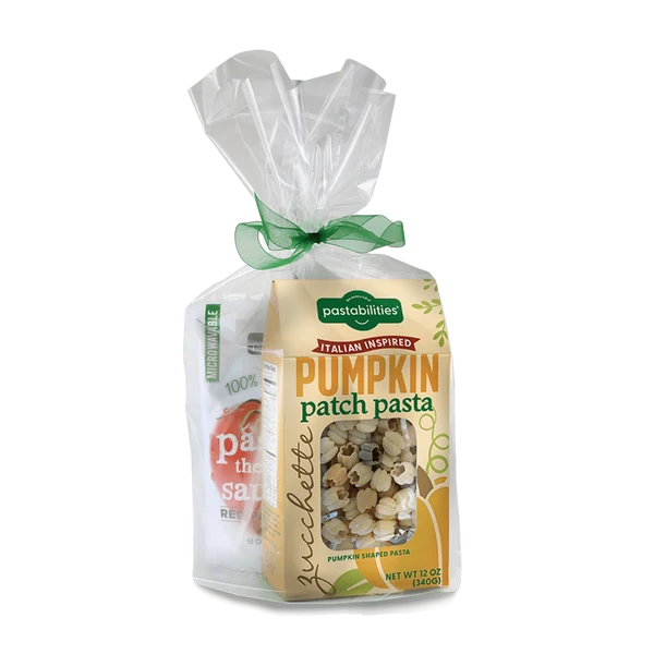 A bag of Pastabilities pumpkin patch pasta with a green ribbon bow, shown on a clean white background.