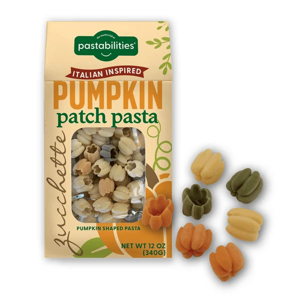 A package of Pastabilities pumpkin patch pasta with several colorful pasta pieces displayed to the right on a white background.