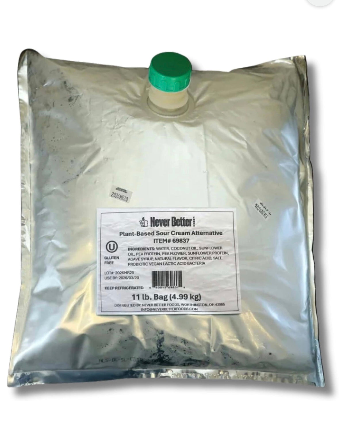Never Better Foods plant-based sour cream in an 11 lb bulk bag with a green cap
