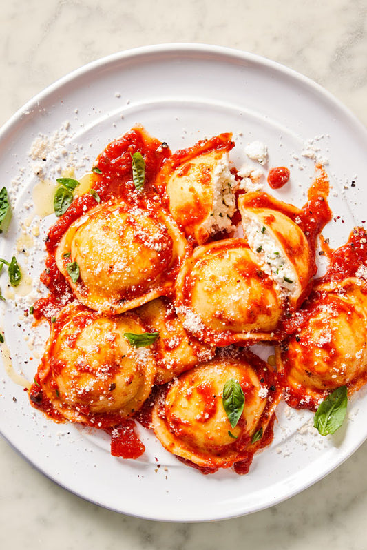 Sergio’s Signature Burrata Raviolis with Marinara Sauce - includes 24 Ravioli & 2 Marinara Sauces