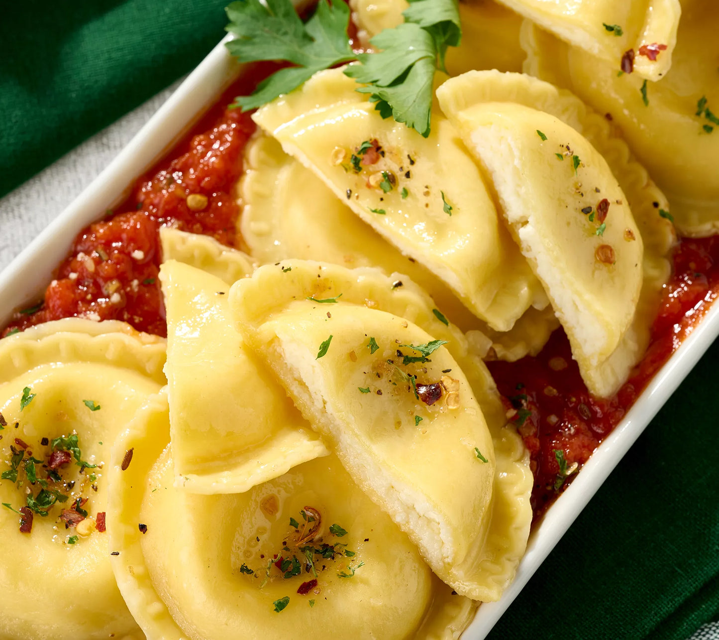 Sergio’s Signature Burrata Raviolis with Marinara Sauce - includes 24 Ravioli & 2 Marinara Sauces