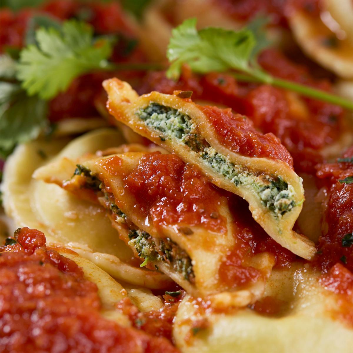 Sergio’s Signature Spinach Garlic Raviolis with Marinara Sauce - includes 24 Ravioli & 2 Marinara Sauces