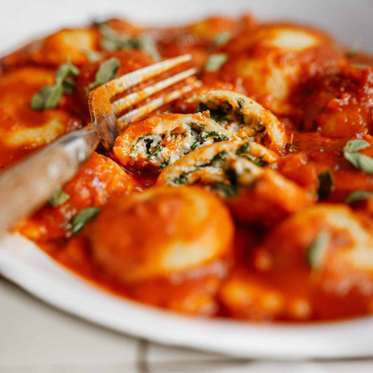 Sergio’s Signature Spinach Garlic Raviolis with Marinara Sauce - includes 24 Ravioli & 2 Marinara Sauces