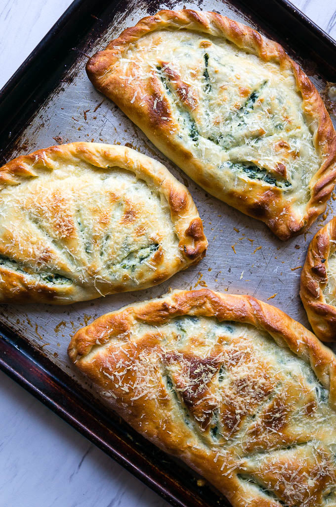 Ricotta and Spinach Calzones – The Table Gourmet
