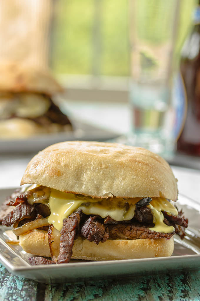 STEAK SANDWICH WITH ONIONS, MUSHROOMS, HAVARTI & AVOCADO