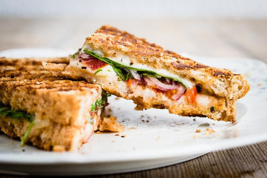 Tomato, Mozzarella, and Basil Panini with Basil Pesto Truffle Sauce