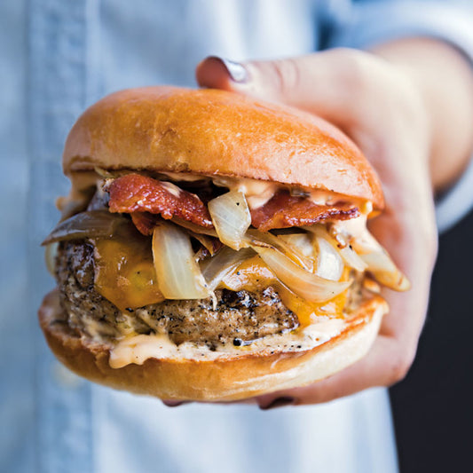 Turkey Burgers with Cheddar, Sautéed Onions and Bacon