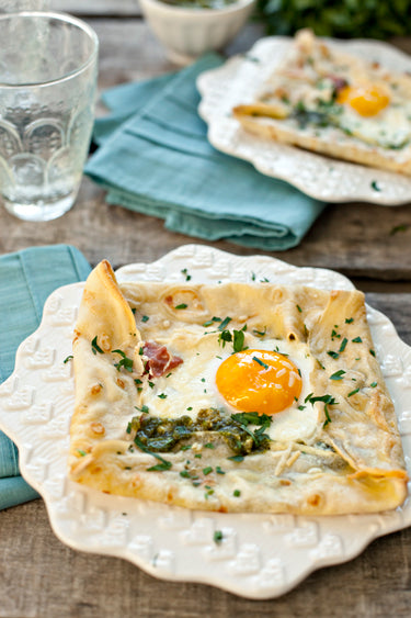 BAKED GREEN EGGS WITH PROSCIUTTO AND PESTO