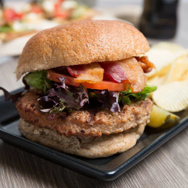 AdvancePierre Foods Tenderbroil 4 oz. Fully Cooked Beef Patties - 64/Case