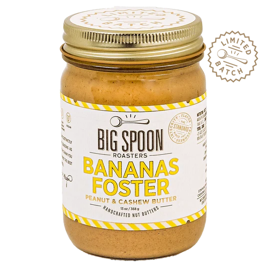 A jar of Big Spoon Roasters Banana Foster peanut and cashew butter with a gold lid and white label, shown on a white background with a 'Limited Batch' badge.