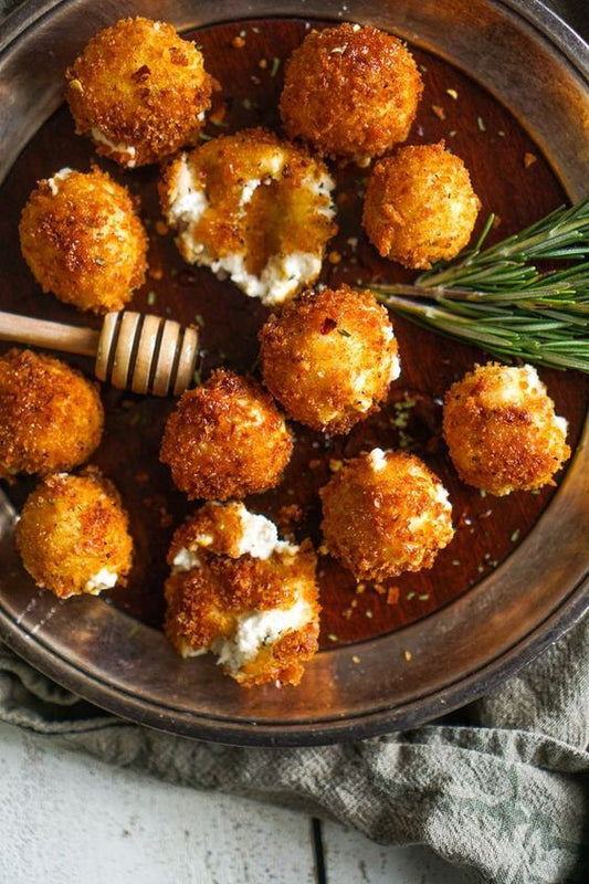 Artichoke and Goat Cheese Bites - 50 pieces per tray