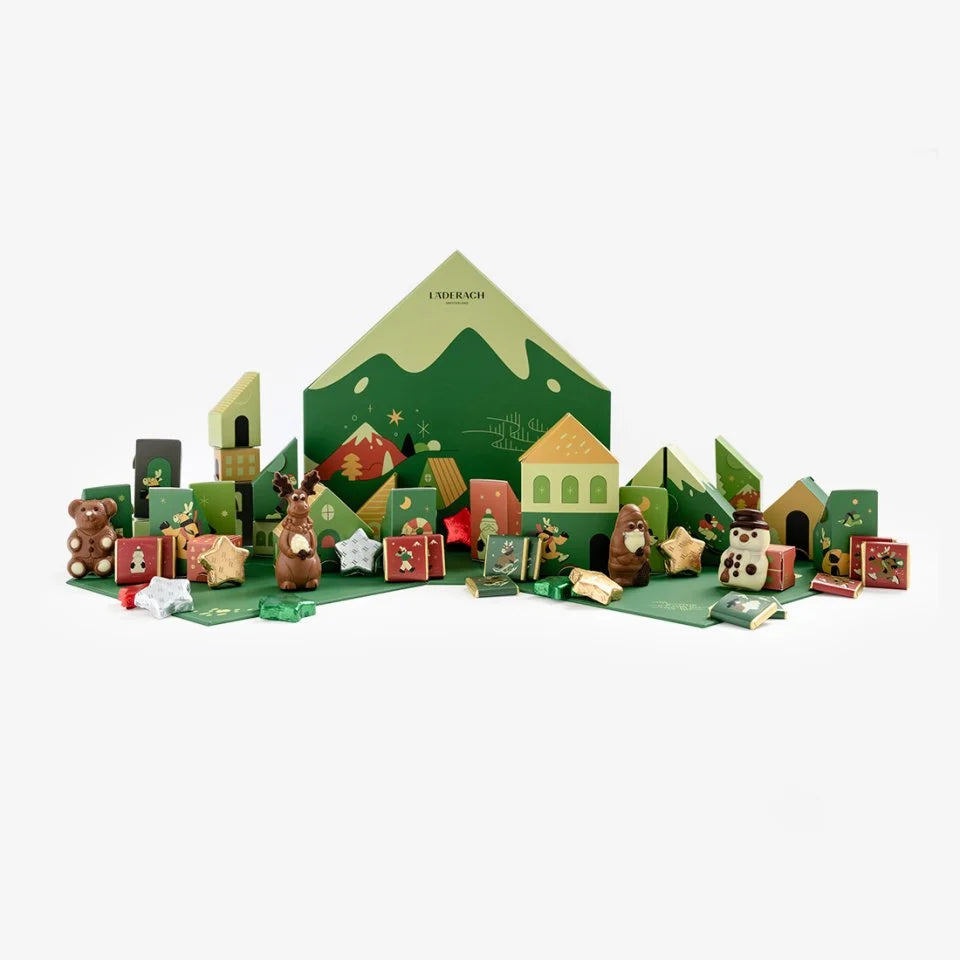 Läderach Advent calendar winter village with chocolate figures, wrapped stars and chocolate squares
