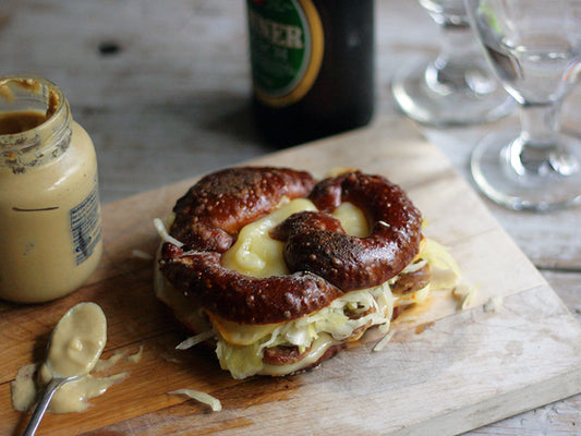 Bratwurst, Sauerkraut, and Muenster Cheese Grilled Cheese on Soft Pretzel