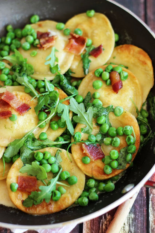 Pan-Seared Ravioli with Bacon, Peas, and Arugula