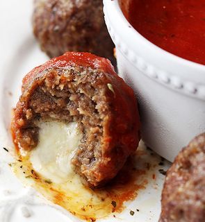 Cheesy Stuffed Meatballs over Spaghetti